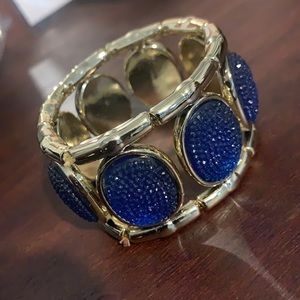 This bracelet is very pretty! It is sparkly blue!